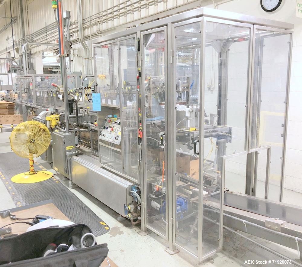 Used Hamrick drop packer, Model Divider, Serial # 91-767. Currently set up for 3-lane operation. 3/60/460V.