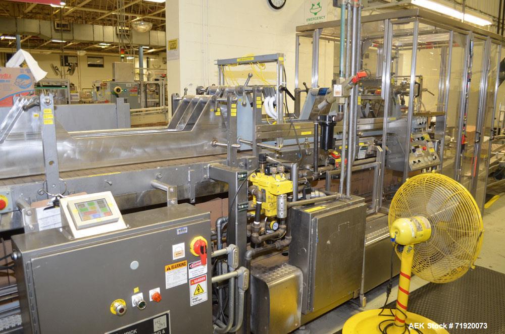 Used Hamrick drop packer, Model Divider, Serial # 91-767. Currently set up for 3-lane operation. 3/60/460V.