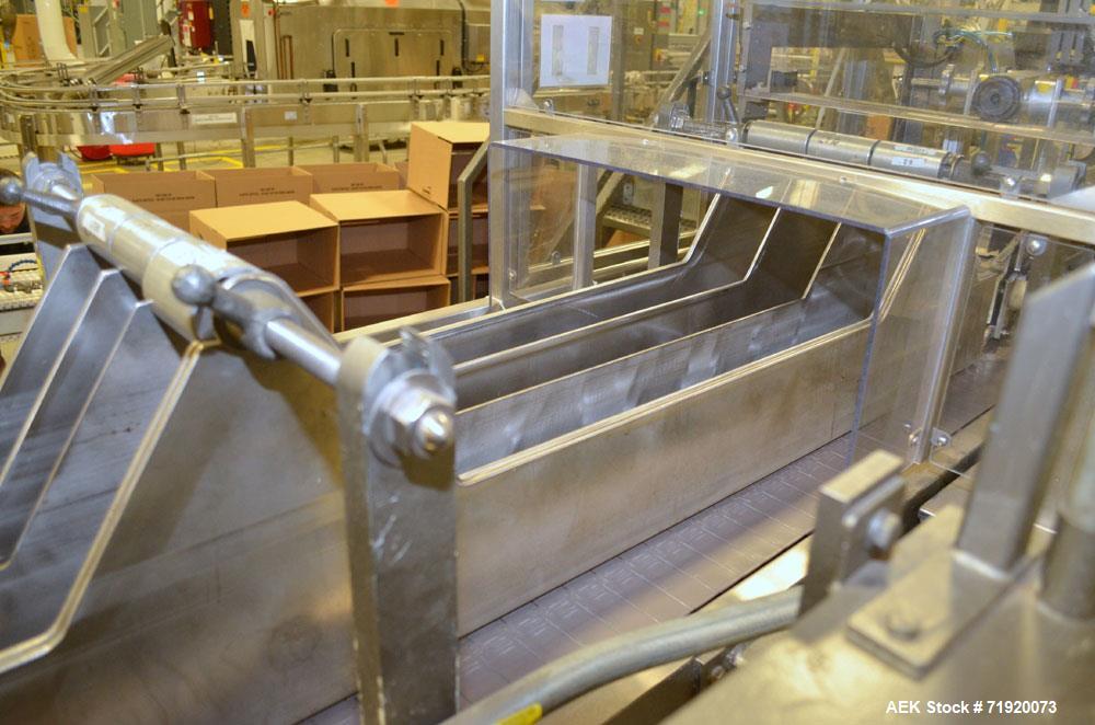 Used Hamrick drop packer, Model Divider, Serial # 91-767. Currently set up for 3-lane operation. 3/60/460V.