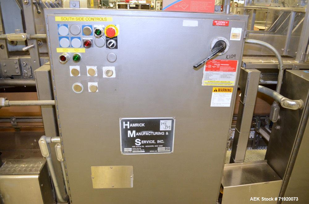 Used- Hamrick drop packer, Model Divider, Serial # 91-767. Currently set up for 3-lane operation. 3/60/460V.