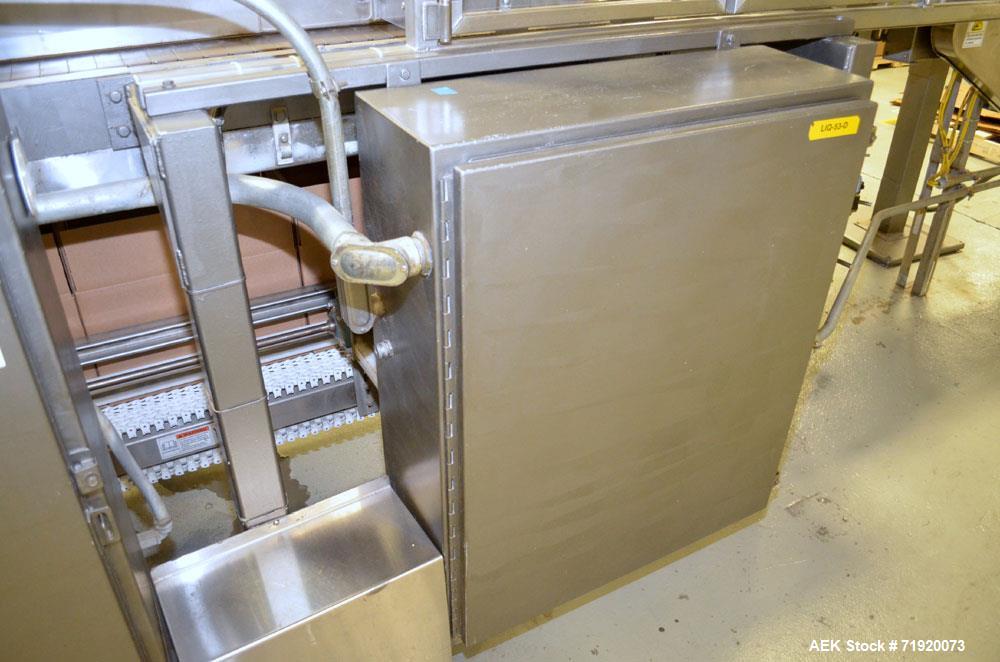 Used Hamrick drop packer, Model Divider, Serial # 91-767. Currently set up for 3-lane operation. 3/60/460V.