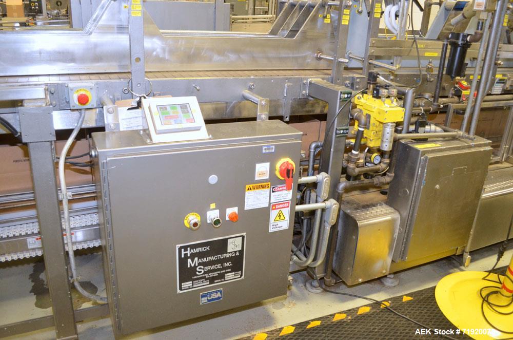 Used Hamrick drop packer, Model Divider, Serial # 91-767. Currently set up for 3-lane operation. 3/60/460V.