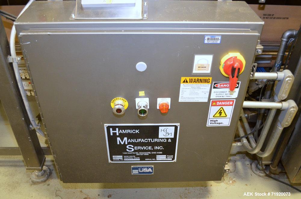 Used Hamrick drop packer, Model Divider, Serial # 91-767. Currently set up for 3-lane operation. 3/60/460V.
