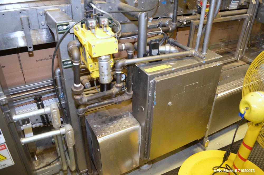Used Hamrick drop packer, Model Divider, Serial # 91-767. Currently set up for 3-lane operation. 3/60/460V.