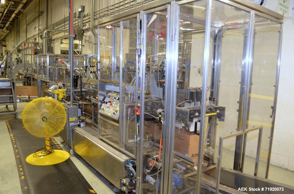 Used Hamrick drop packer, Model Divider, Serial # 91-767. Currently set up for 3-lane operation. 3/60/460V.