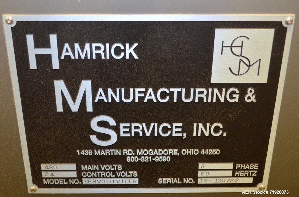 Used- Hamrick drop packer, Model Divider, Serial # 91-767. Currently set up for 3-lane operation. 3/60/460V.