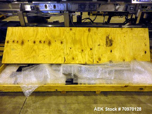 Used Hartness 825-AT automatic stainless steel drop case packer case packer capable of speeds up to 35 cases per minute (depending on product and application). Case size range: (Length) 6" - 24" (Wid...