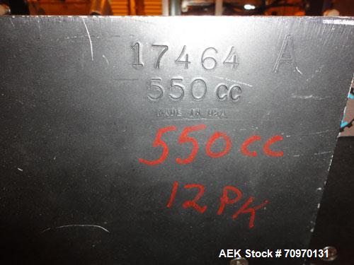 Used Hartness International 825AT Case Packer Change Parts. Consisting Of: 3 skids, 3 carts. 580cc (12pk), 1875cc (6pk.), 850cc (6pk.), 1250cc (6pk.), 1875cc (8pk.), 850cc (12pk.), 5.5 oz. (12pk.), 1...
