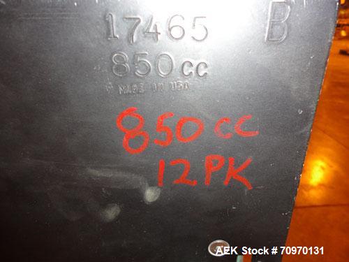 Used Hartness International 825AT Case Packer Change Parts. Consisting Of: 3 skids, 3 carts. 580cc (12pk), 1875cc (6pk.), 850cc (6pk.), 1250cc (6pk.), 1875cc (8pk.), 850cc (12pk.), 5.5 oz. (12pk.), 1...