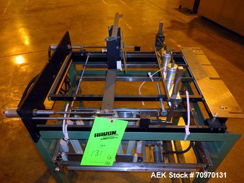 Used Hartness International 825AT Case Packer Change Parts. Consisting Of: 3 skids, 3 carts. 580cc (12pk), 1875cc (6pk.), 850cc (6pk.), 1250cc (6pk.), 1875cc (8pk.), 850cc (12pk.), 5.5 oz. (12pk.), 1...