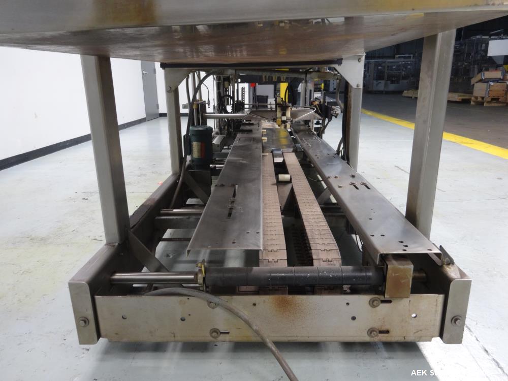 Used Hartness Model 825 Automatic Drop Case Packer