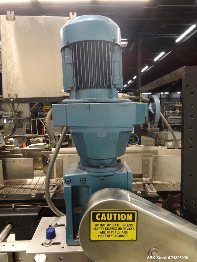 Used Hartness Model 825 Automatic Drop Case Packer