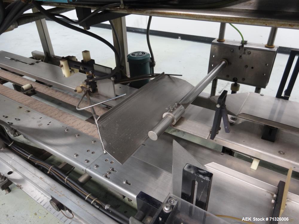 Used Hartness Model 825 Automatic Drop Case Packer