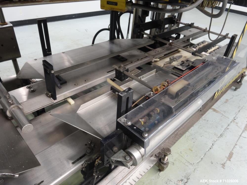 Used Hartness Model 825 Automatic Drop Case Packer