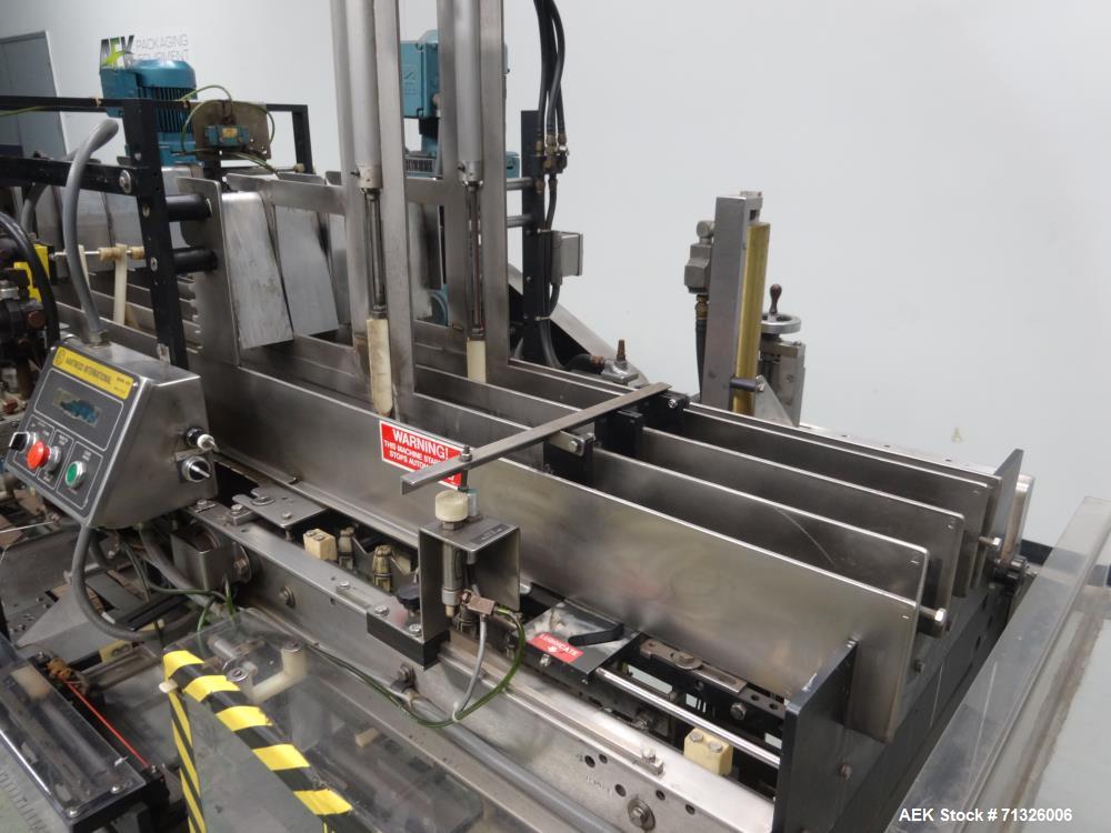 Used Hartness Model 825 Automatic Drop Case Packer