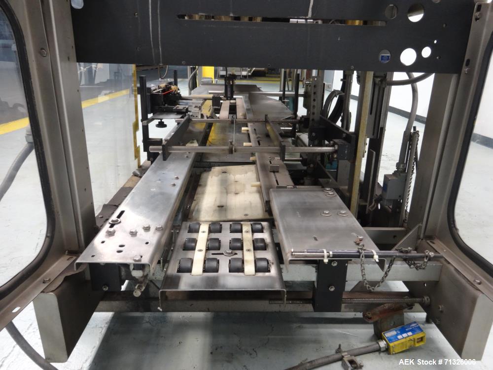 Used Hartness Model 825 Automatic Drop Case Packer