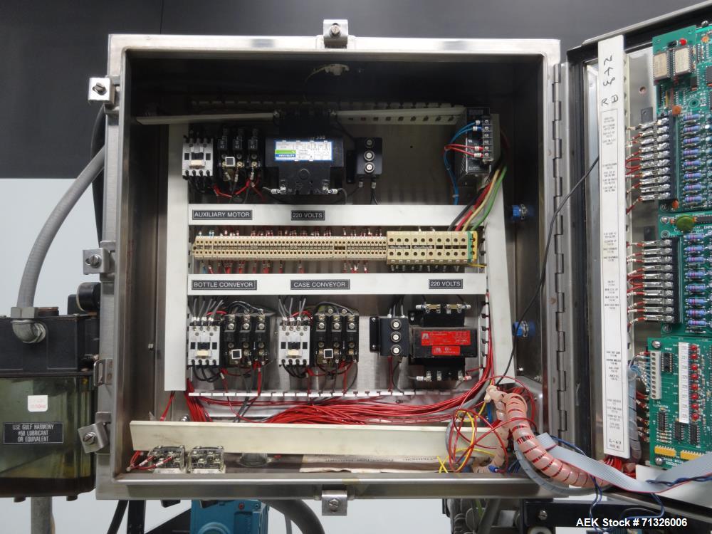 Used Hartness Model 825 Automatic Drop Case Packer