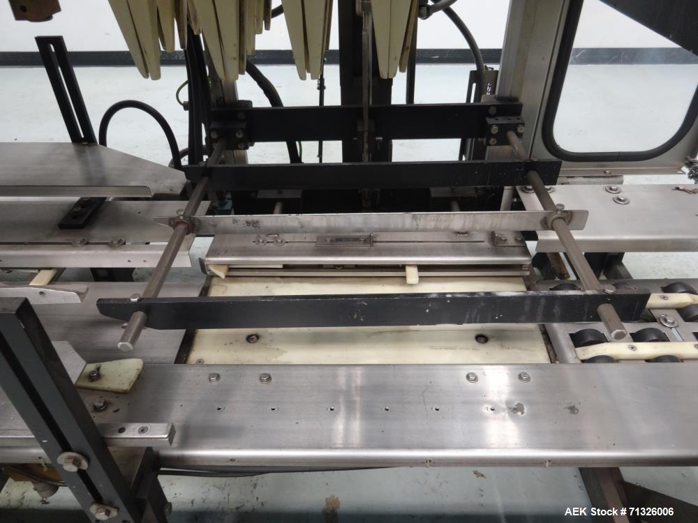 Used Hartness Model 825 Automatic Drop Case Packer