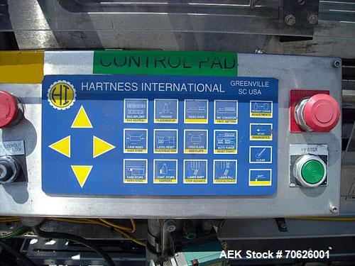 Used Hartness Model 825 Fully Auto Case Packer with all stainless steel frame.Unit has been recently upgraded from factory with Parker drives for auto-laner.Panel is complete with AB 503 PLC controll...