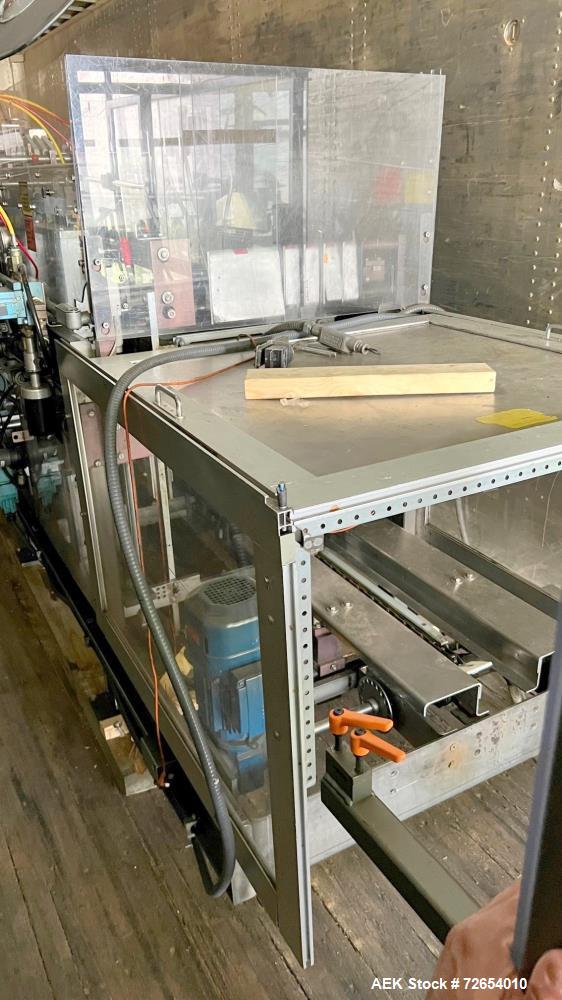 Used-Hartness Model 835 Automatic Descending Drop Case Packer