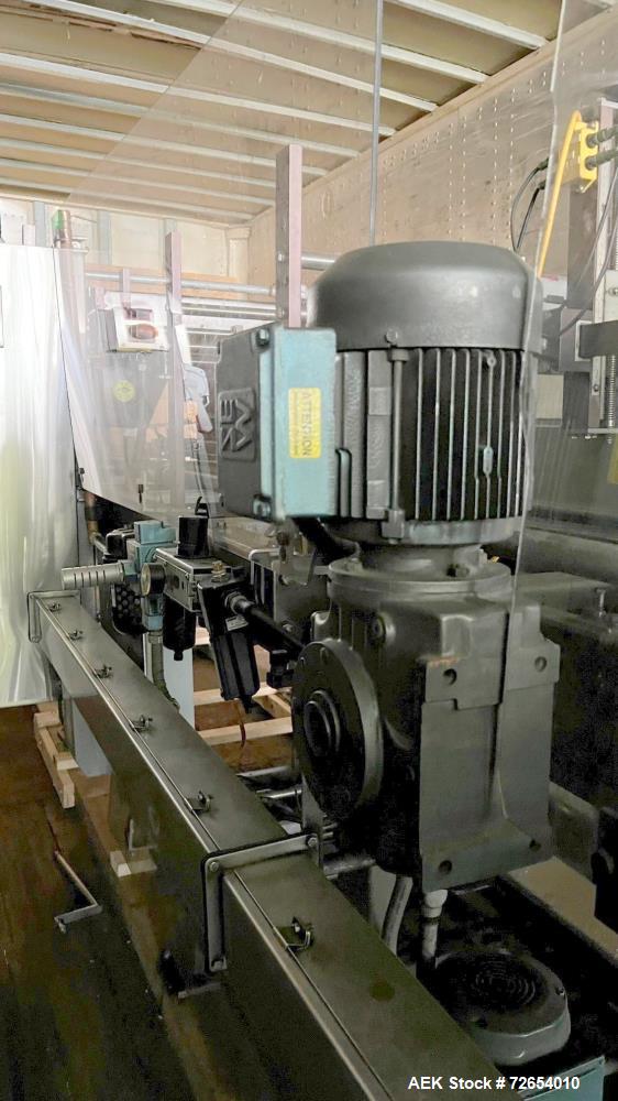 Used Hartness Model 835 Automatic Descending Drop Case Packer