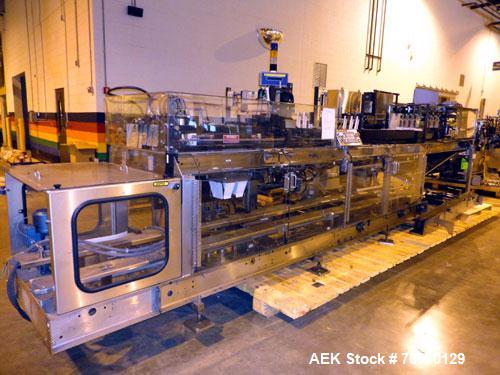 Used- Hartness 900 automatic drop case packer capable of speeds up to 25 cases per minute (depending on product and applicat...