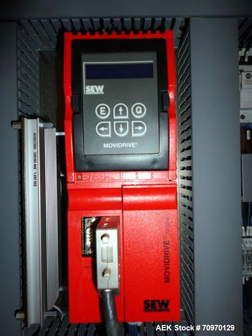 Used- Hartness 900 automatic drop case packer capable of speeds up to 25 cases per minute (depending on product and applicat...