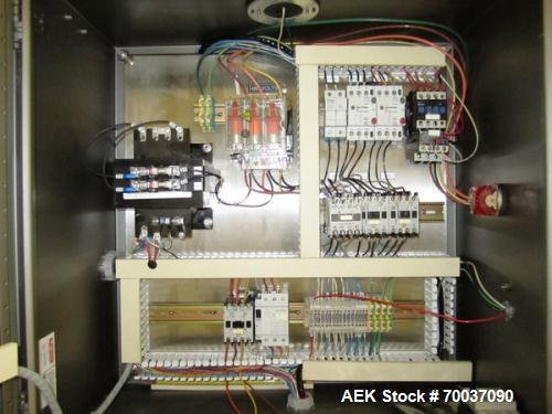 Used Hartness Case Packer with Infeed Laner, Model CP900/825. Servo controlled lowering head drop packer capable of speeds up to 30cpm. Allen Bradley SLC 5/04 PLC with Pacific Scientific servo contro...