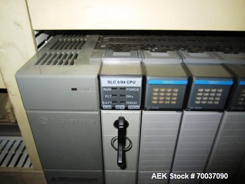 Used Hartness Case Packer with Infeed Laner, Model CP900/825. Servo controlled lowering head drop packer capable of speeds up to 30cpm. Allen Bradley SLC 5/04 PLC with Pacific Scientific servo contro...