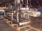 Used Hartness International 825SS drop case packer. Capable of speeds up to 25 CPM. Case size range: length 7