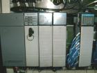Used Hartness International 825SS drop case packer. Capable of speeds up to 25 CPM. Case size range: length 7