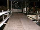 Used Hartness International 825SS drop case packer. Capable of speeds up to 25 CPM. Case size range: length 7