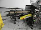 Used Combi Packaging Systems Model DPI Drop Case Packer. Has a model 2LD128 laner option. Capable of speeds up to 28 cases per minute. Has a case size range: (length) 4.5