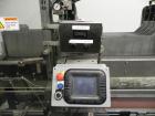 Used Combi Packaging Systems Model DPI Drop Case Packer. Has a model 2LD128 laner option. Capable of speeds up to 28 cases per minute. Has a case size range: (length) 4.5