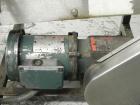 Used Combi Packaging Systems Model DPI Drop Case Packer. Has a model 2LD128 laner option. Capable of speeds up to 28 cases per minute. Has a case size range: (length) 4.5