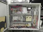 Used Combi Packaging Systems Model DPI Drop Case Packer. Has a model 2LD128 laner option. Capable of speeds up to 28 cases per minute. Has a case size range: (length) 4.5