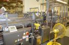 Used Hamrick drop packer, Model Divider, Serial # 91-767. Currently set up for 3-lane operation. 3/60/460V.