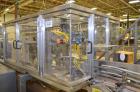 Used Hamrick drop packer, Model Divider, Serial # 91-767. Currently set up for 3-lane operation. 3/60/460V.