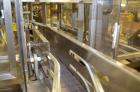 Used Hamrick drop packer, Model Divider, Serial # 91-767. Currently set up for 3-lane operation. 3/60/460V.