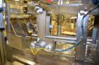 Used Hamrick drop packer, Model Divider, Serial # 91-767. Currently set up for 3-lane operation. 3/60/460V.