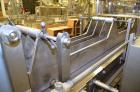 Used Hamrick drop packer, Model Divider, Serial # 91-767. Currently set up for 3-lane operation. 3/60/460V.
