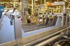 Used Hamrick drop packer, Model Divider, Serial # 91-767. Currently set up for 3-lane operation. 3/60/460V.
