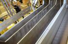Used Hamrick drop packer, Model Divider, Serial # 91-767. Currently set up for 3-lane operation. 3/60/460V.