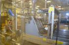 Used Hamrick drop packer, Model Divider, Serial # 91-767. Currently set up for 3-lane operation. 3/60/460V.