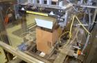 Used Hamrick drop packer, Model Divider, Serial # 91-767. Currently set up for 3-lane operation. 3/60/460V.