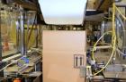 Used Hamrick drop packer, Model Divider, Serial # 91-767. Currently set up for 3-lane operation. 3/60/460V.