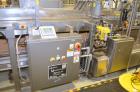 Used Hamrick drop packer, Model Divider, Serial # 91-767. Currently set up for 3-lane operation. 3/60/460V.