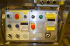 Used Hamrick drop packer, Model Divider, Serial # 91-767. Currently set up for 3-lane operation. 3/60/460V.