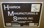 Used Hamrick drop packer, Model Divider, Serial # 91-767. Currently set up for 3-lane operation. 3/60/460V.