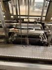 Used Hartness Model 2800 Automatic Drop Case Packer | High-Speed End-of-Line Packaging System